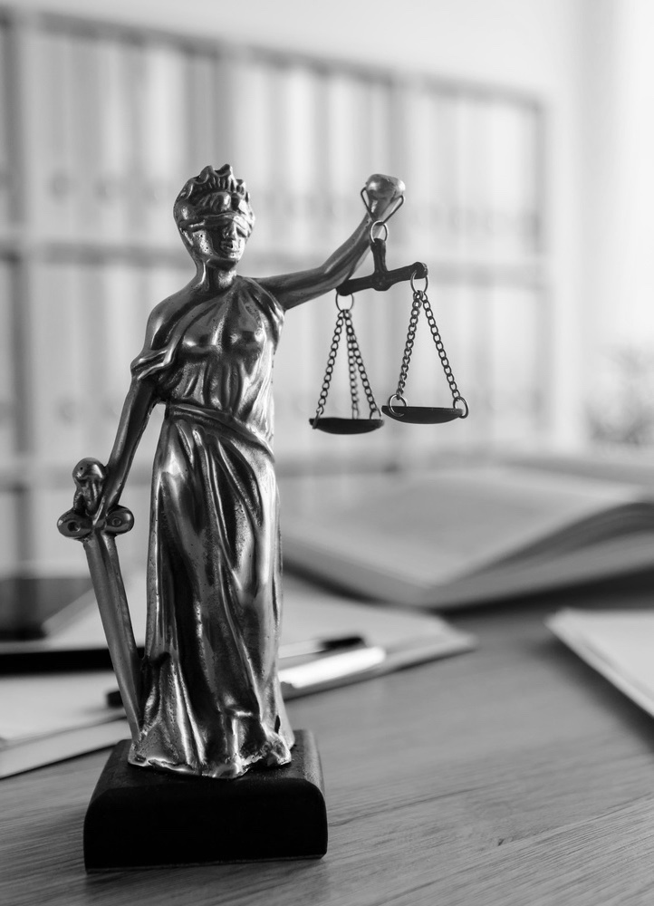Lady Justice statue in law firm office